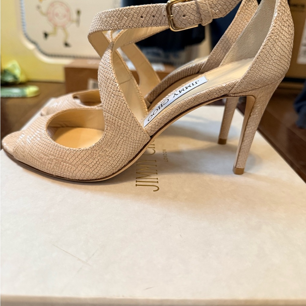 Jimmy Choo Emily 85 Nude embossed leather heels.
New in box. Size 6.5
STUNNING - Picture 6 of 13